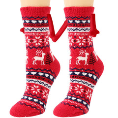 Fournitures de Noël Aspiration magnétique main dans la main Couple chaussettes corail polaire Tube chaussettes chaud pantoufle lit chaussettes hiver doux chaud pantoufle